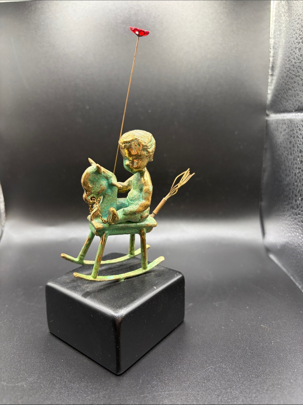 Malcolm Moran bronze statue. Baby on rocking horse, signed and dated. 6.5” tall